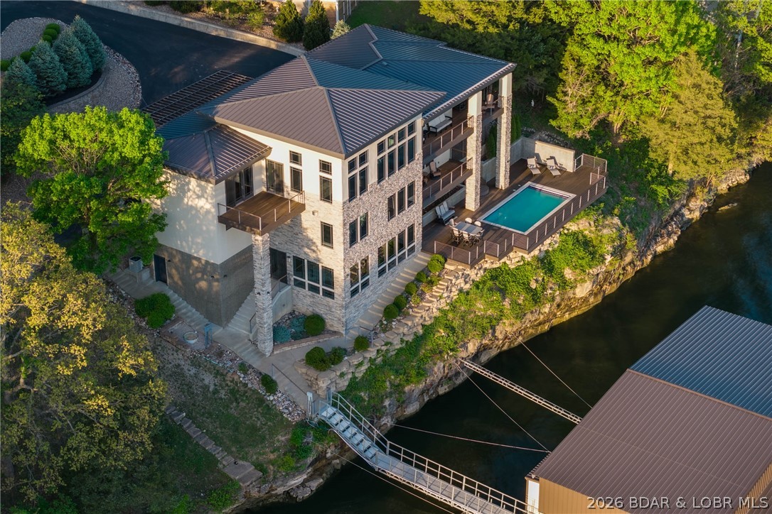 777 Malibu Road Osage Beach, MO 65065 - Photo 9 of 100 Luxury without limits-stretching from land to lake