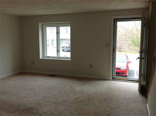 2-3 Oak Ridge Drive, Unit 23 Maynard, MA 01754 - Photo 8 of 18 an empty room with windows