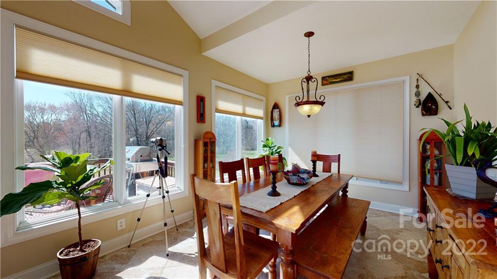 3908 Thompson Road Lancaster, SC 29720 - Photo 22 of 36 a living room with furniture and a potted plant