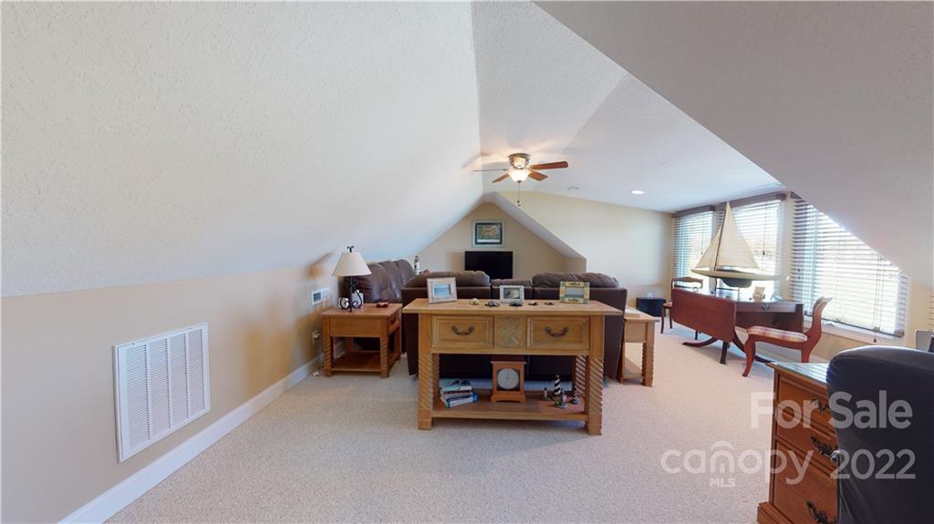 3908 Thompson Road Lancaster, SC 29720 - Photo 31 of 36 a living room with furniture and a dining table