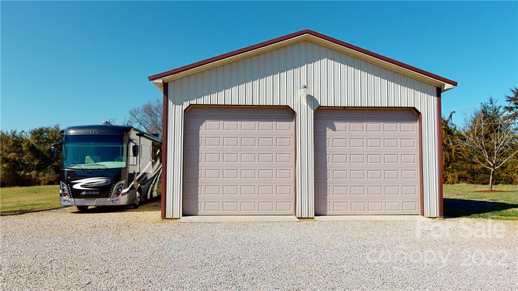 3908 Thompson Road Lancaster, SC 29720 - Photo 9 of 36 a view of garage with parked car