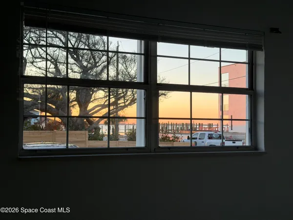 a view of a large window with an outdoor space