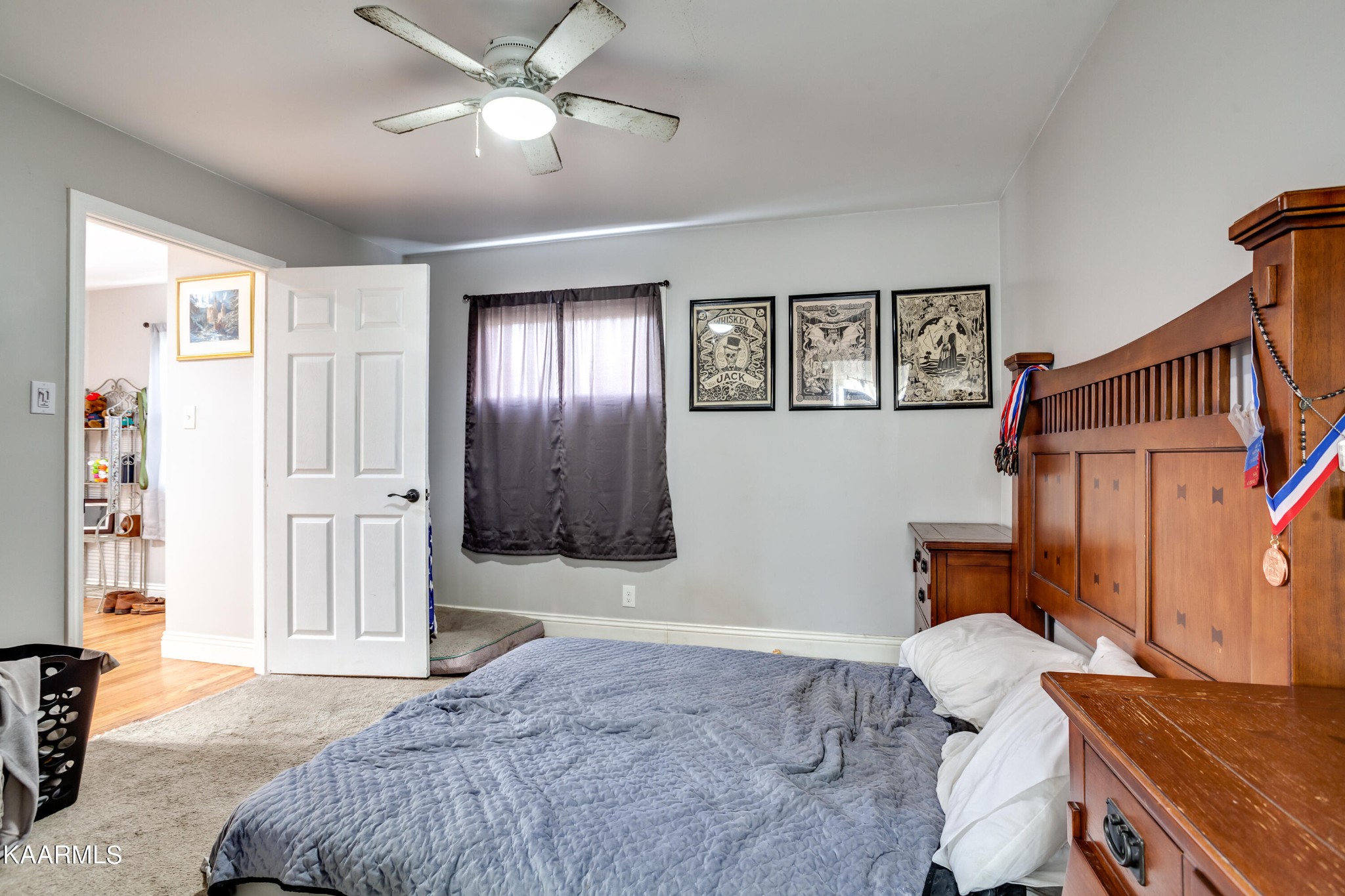303 West Faunce Road Oak Ridge, TN 37830 - Photo 17 of 28 a bedroom with a bed furniture and a window