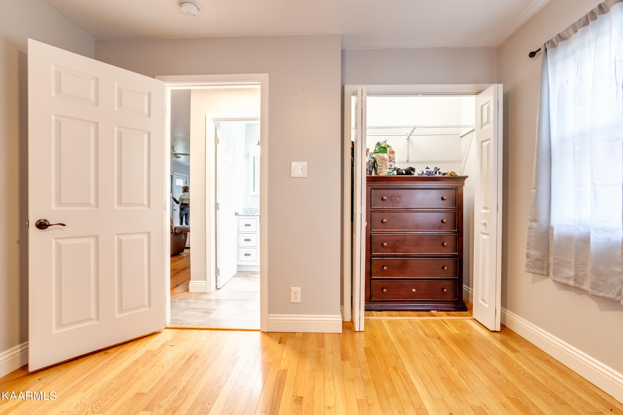 303 West Faunce Road Oak Ridge, TN 37830 - Photo 24 of 28 an empty room with window and wooden floor