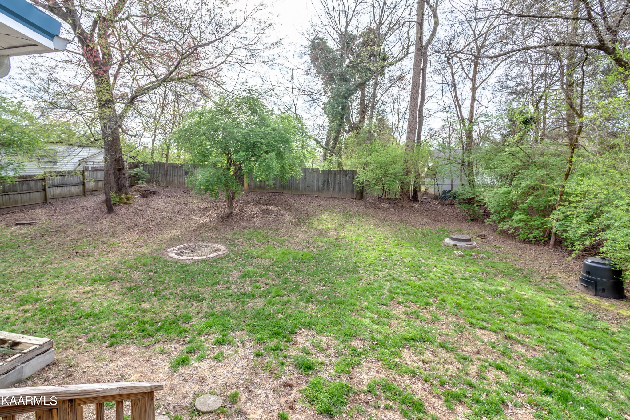 303 West Faunce Road Oak Ridge, TN 37830 - Photo 25 of 28 a view of a backyard with large trees