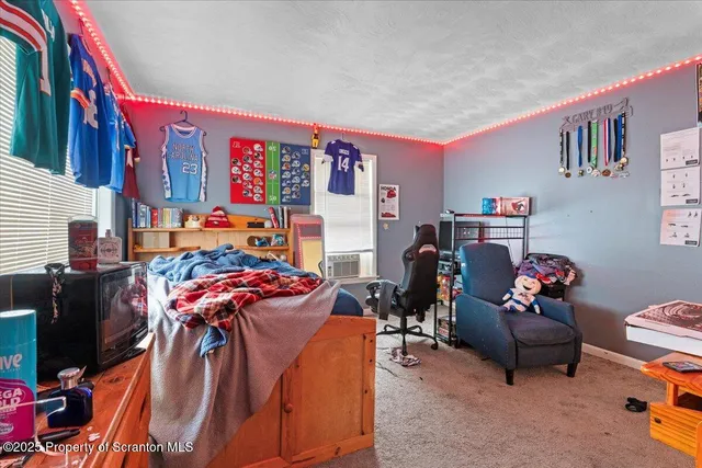 a living room filled with furniture and a couch