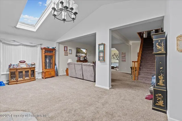 a view of livingroom with hardwood and furniture