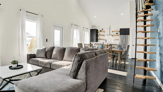 a kitchen with stainless steel appliances granite countertop a stove and a refrigerator