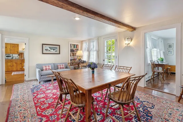 a kitchen with stainless steel appliances a refrigerator sink and wooden cabinets