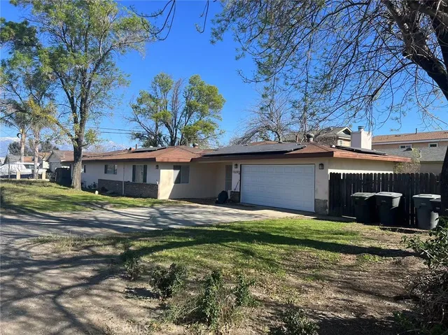 a house view with a garden space