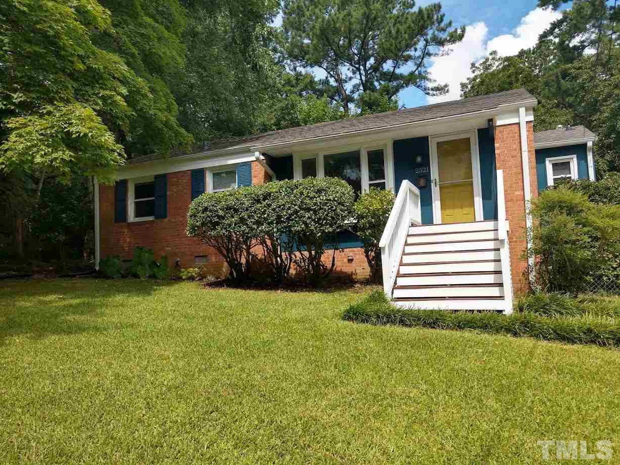2521 Remington Road Raleigh, NC 27610 - Photo 1 of 30 a front view of house with yard and green space