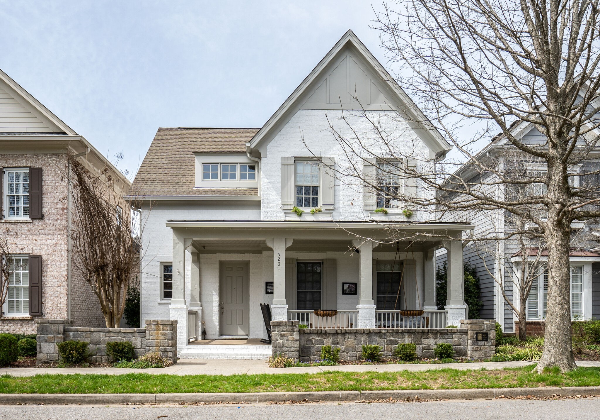 523 Ardmore Place Franklin, TN 37064 - Photo 1 of 24 a view of a brick building next to a yard