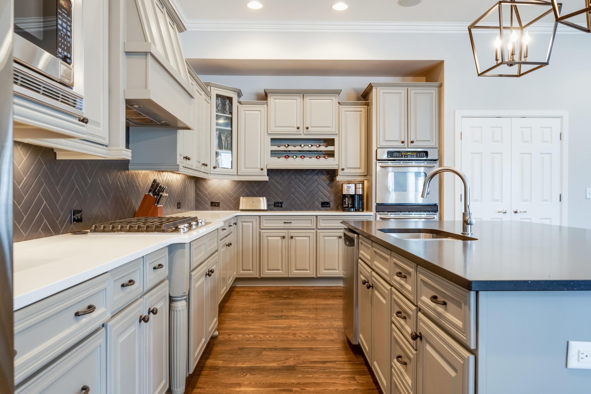 523 Ardmore Place Franklin, TN 37064 - Photo 13 of 24 a kitchen with stainless steel appliances granite countertop a sink stove and cabinets