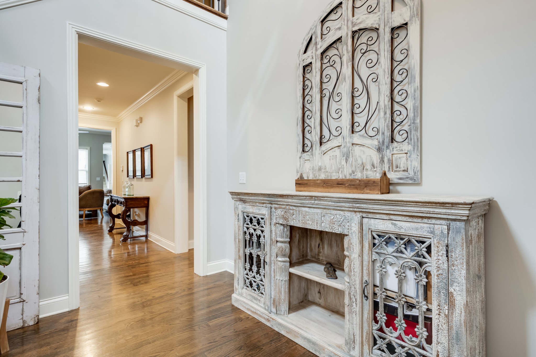 523 Ardmore Place Franklin, TN 37064 - Photo 5 of 24 an entryway with a fireplace and wooden floor