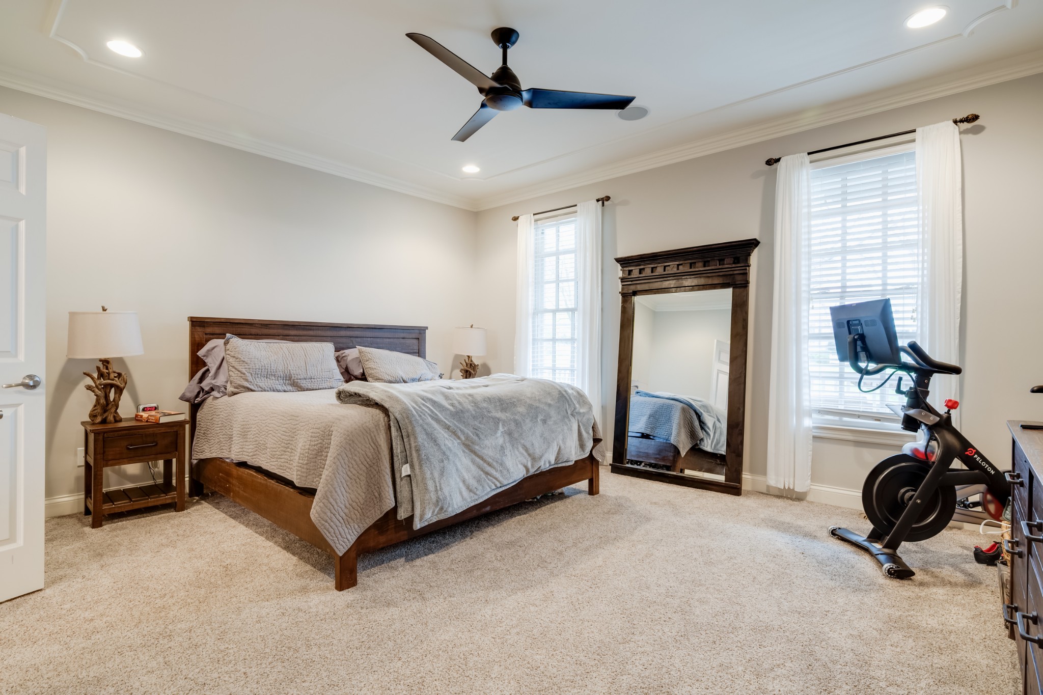 523 Ardmore Place Franklin, TN 37064 - Photo 6 of 24 a bedroom with a bed a couch and a chandelier