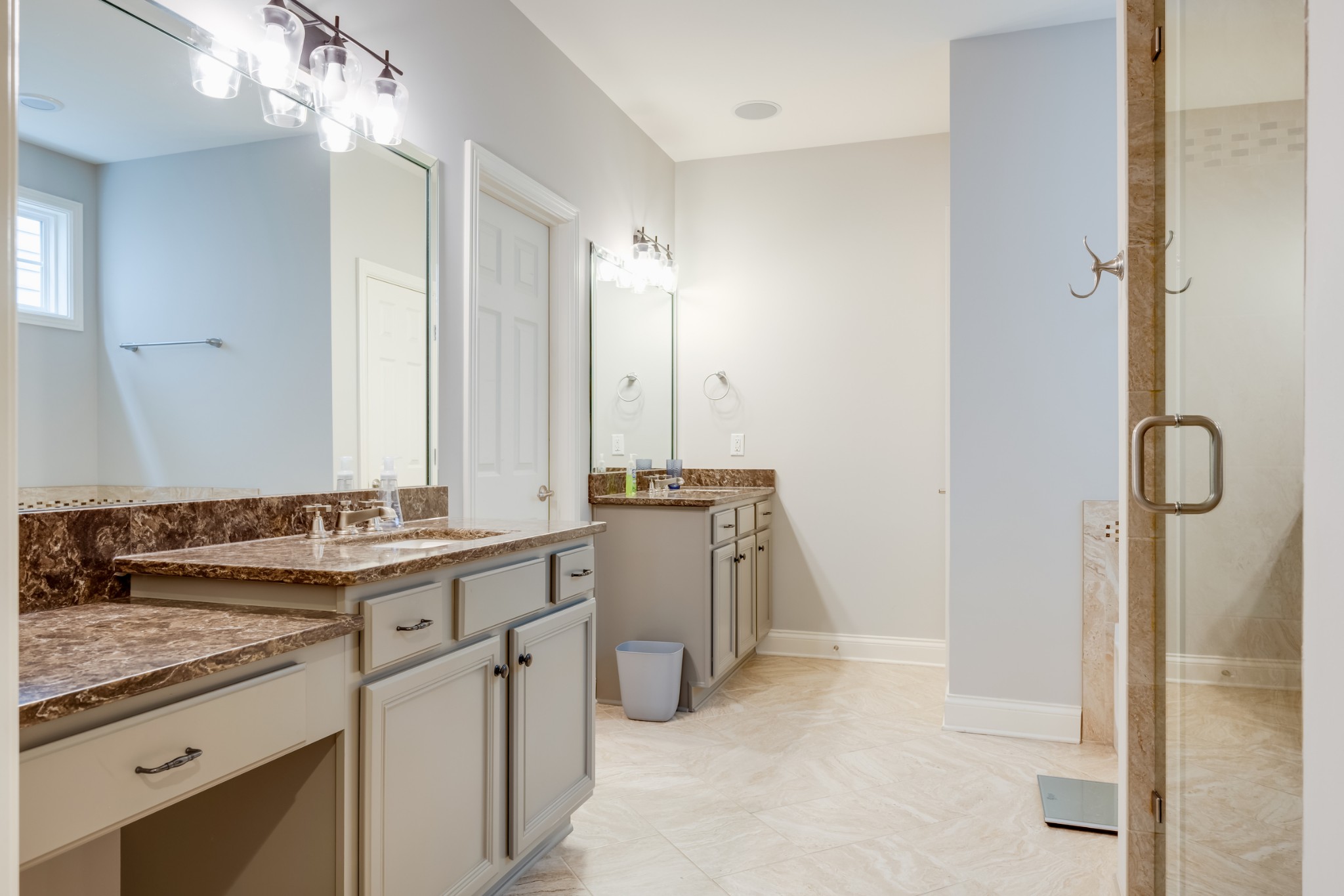 523 Ardmore Place Franklin, TN 37064 - Photo 7 of 24 a bathroom with a granite countertop sink a toilet and a mirror