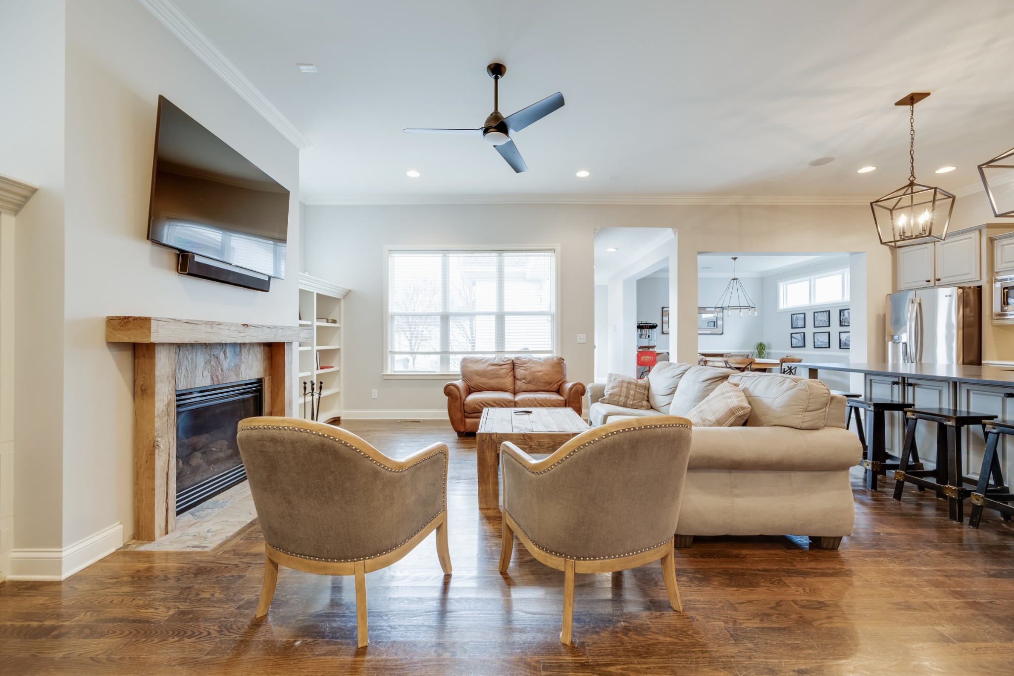 523 Ardmore Place Franklin, TN 37064 - Photo 9 of 24 a living room with fireplace furniture and a flat screen tv
