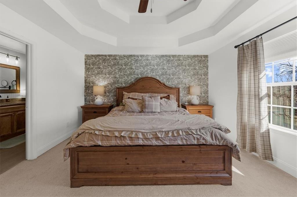 5413 Stepstone Way Gainesville, GA 30506 - Photo 19 of 36 a bedroom with a bed and window