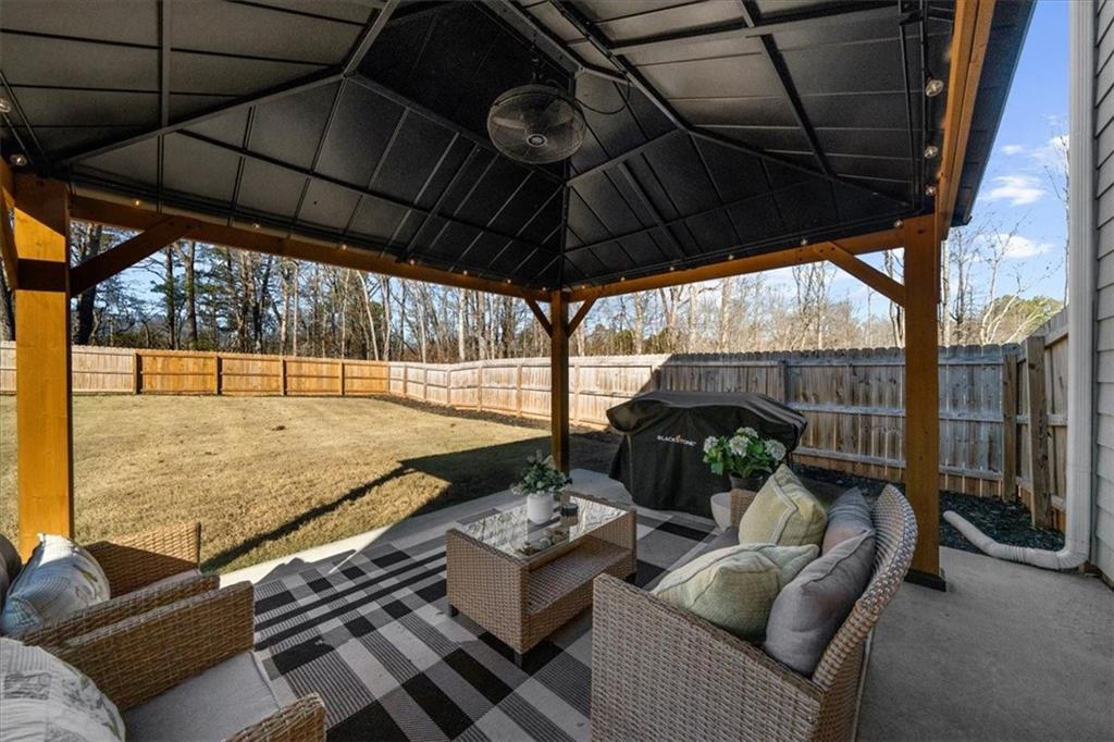 5413 Stepstone Way Gainesville, GA 30506 - Photo 29 of 36 a backyard of a house with seating space