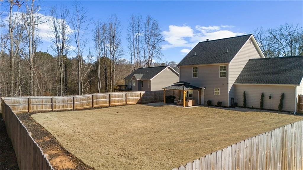 5413 Stepstone Way Gainesville, GA 30506 - Photo 32 of 36 a view of a house with a outdoor space