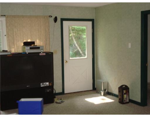99 Patten Pond Road Surry, ME 04684 - Photo 6 of 7 Living Room.