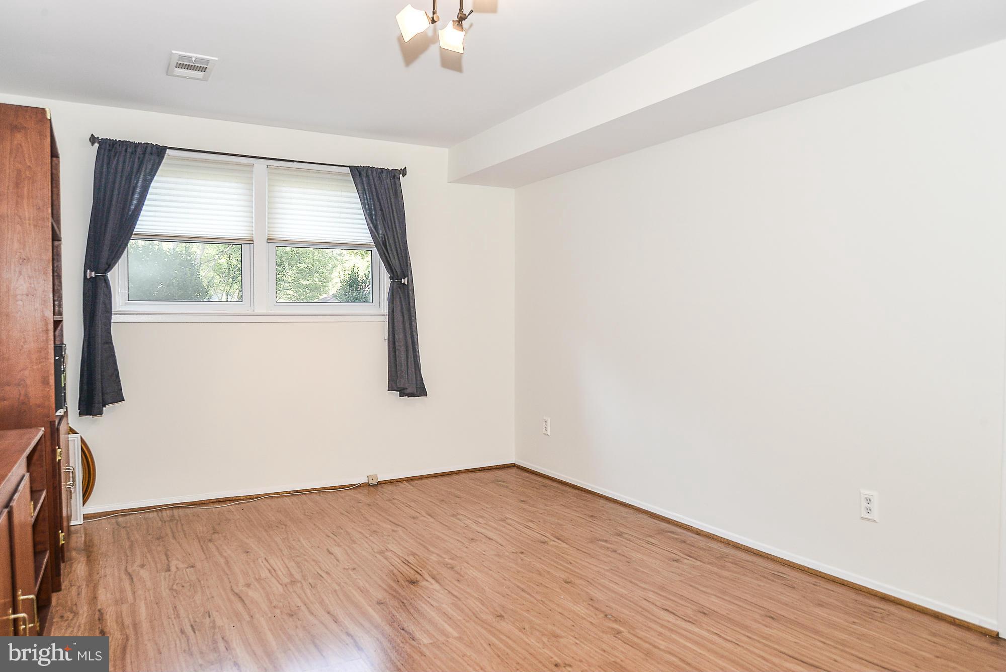 8140 Drayton Lane Springfield, VA 22151 - Photo 18 of 30 an empty room with a window