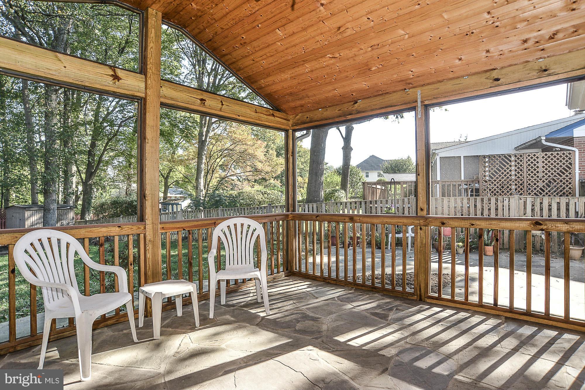 8140 Drayton Lane Springfield, VA 22151 - Photo 23 of 30 a view of a chairs and table in the balcony