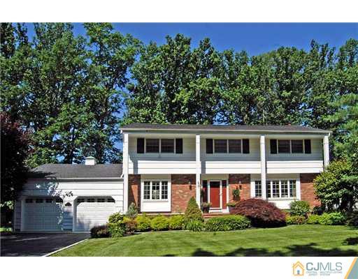 23 Tamarack Road Edison, NJ 08820 - Photo 1 of 23 a front view of a house with a yard