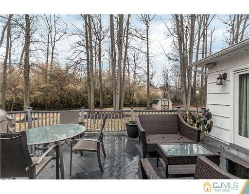 23 Tamarack Road Edison, NJ 08820 - Photo 21 of 23 a view of a chairs and table in patio