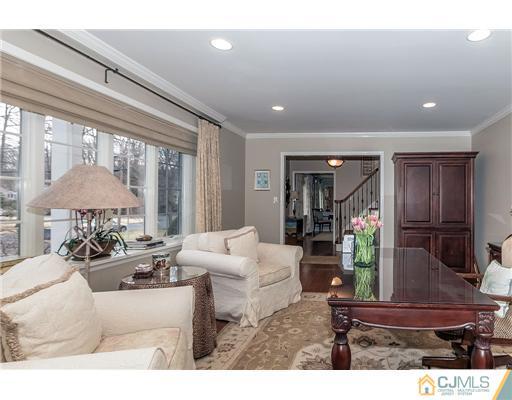 23 Tamarack Road Edison, NJ 08820 - Photo 4 of 23 a living room with furniture and a large window