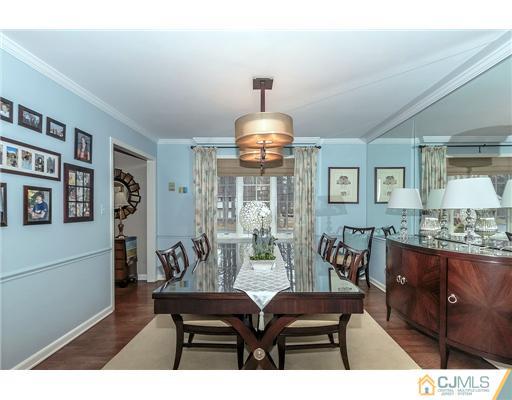 23 Tamarack Road Edison, NJ 08820 - Photo 5 of 23 a view of a dining room with furniture and wooden floor