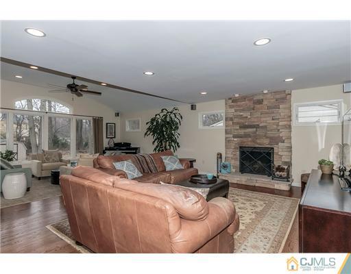23 Tamarack Road Edison, NJ 08820 - Photo 10 of 23 a living room with furniture large window and fireplace