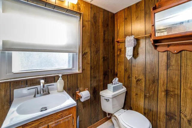 a view of a bathroom with a shower curtain