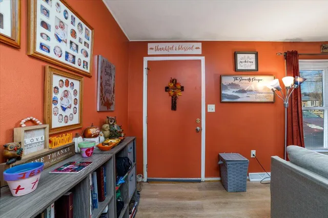 a view of a livingroom with furniture and toys