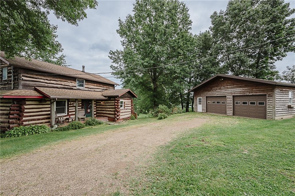 173 Anthony Road Indiana, PA 15701 - Photo 1 of 49 a wooden house with a yard and large trees