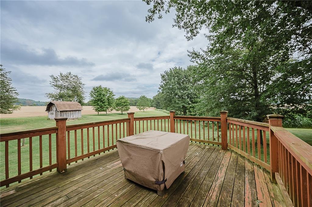 173 Anthony Road Indiana, PA 15701 - Photo 13 of 49 a balcony with wooden floor and fence