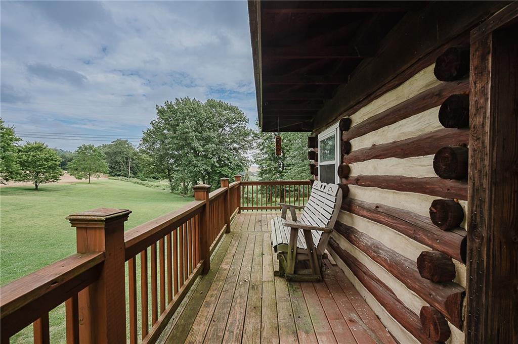 173 Anthony Road Indiana, PA 15701 - Photo 18 of 49 a view of balcony with wooden floor and lake view