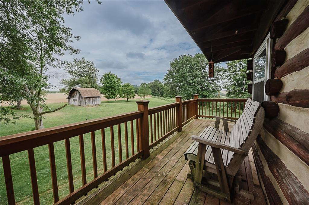 173 Anthony Road Indiana, PA 15701 - Photo 19 of 49 a view of a balcony with wooden floor and outdoor seating