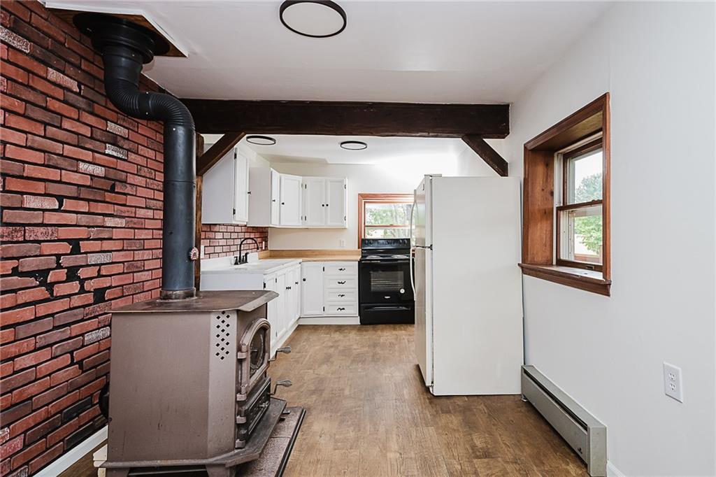 173 Anthony Road Indiana, PA 15701 - Photo 22 of 49 a kitchen with a refrigerator and a stove