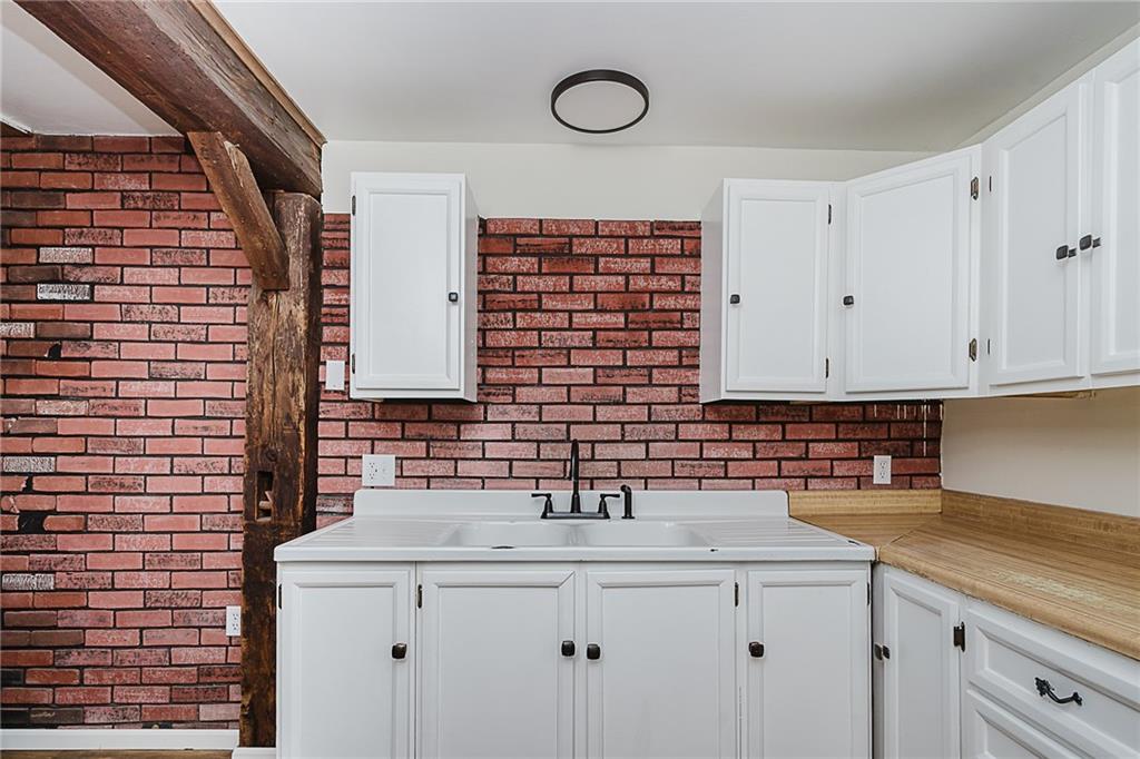 173 Anthony Road Indiana, PA 15701 - Photo 24 of 49 a kitchen with a sink and cabinets