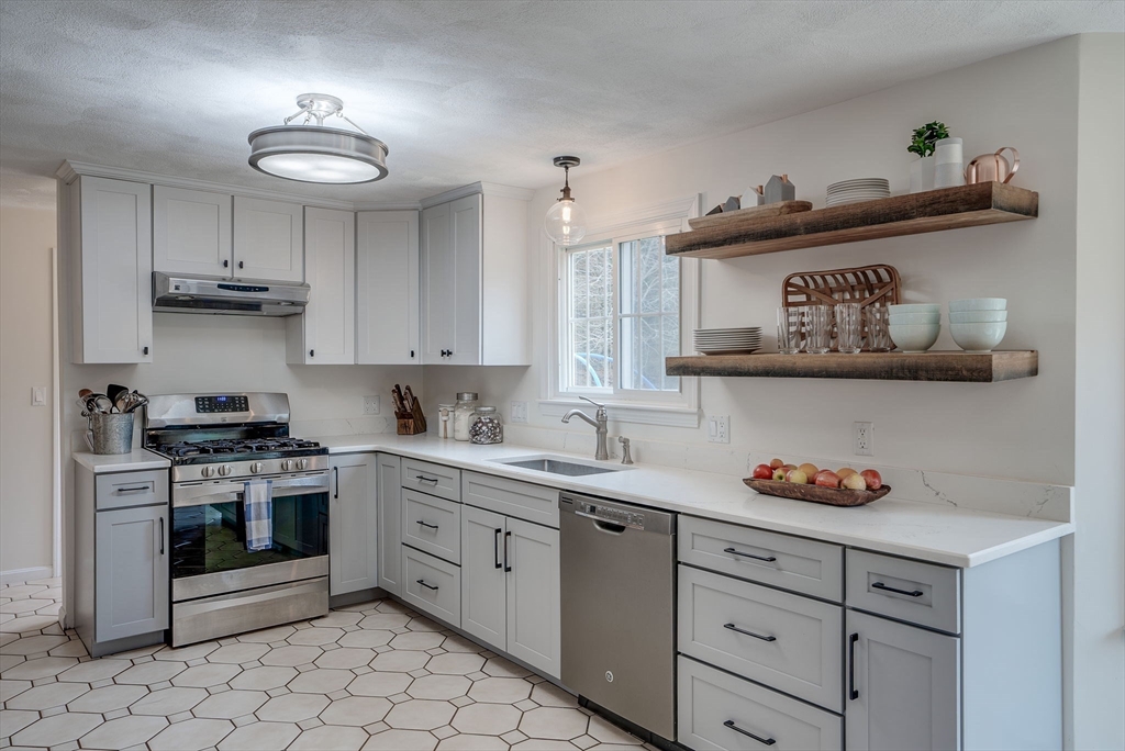 71 Houghton's Mill Road Lunenburg, MA 01462 - Photo 12 of 39 a kitchen with cabinets and window