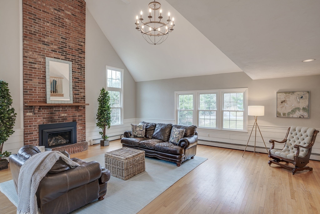 71 Houghton's Mill Road Lunenburg, MA 01462 - Photo 15 of 39 a living room with furniture and a fireplace