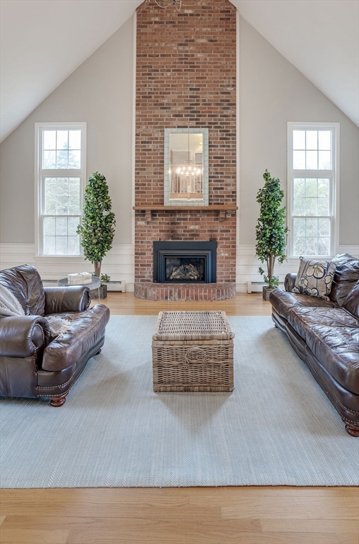 71 Houghton's Mill Road Lunenburg, MA 01462 - Photo 16 of 39 a living room with furniture and a fireplace
