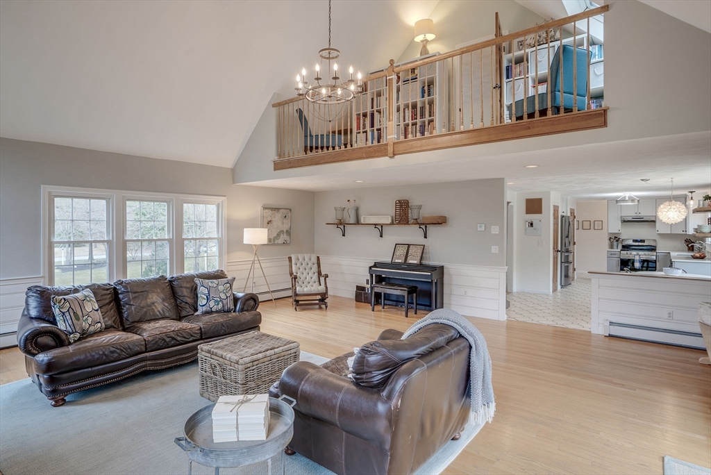71 Houghton's Mill Road Lunenburg, MA 01462 - Photo 18 of 39 a living room with furniture and a chandelier