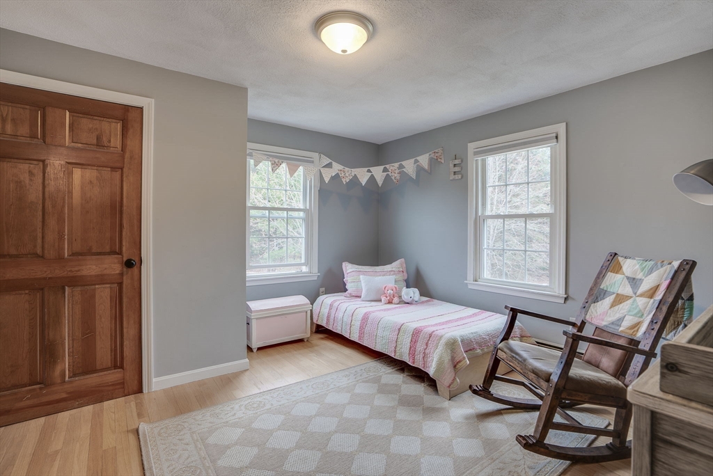 71 Houghton's Mill Road Lunenburg, MA 01462 - Photo 23 of 39 a bedroom with a bed chair and window