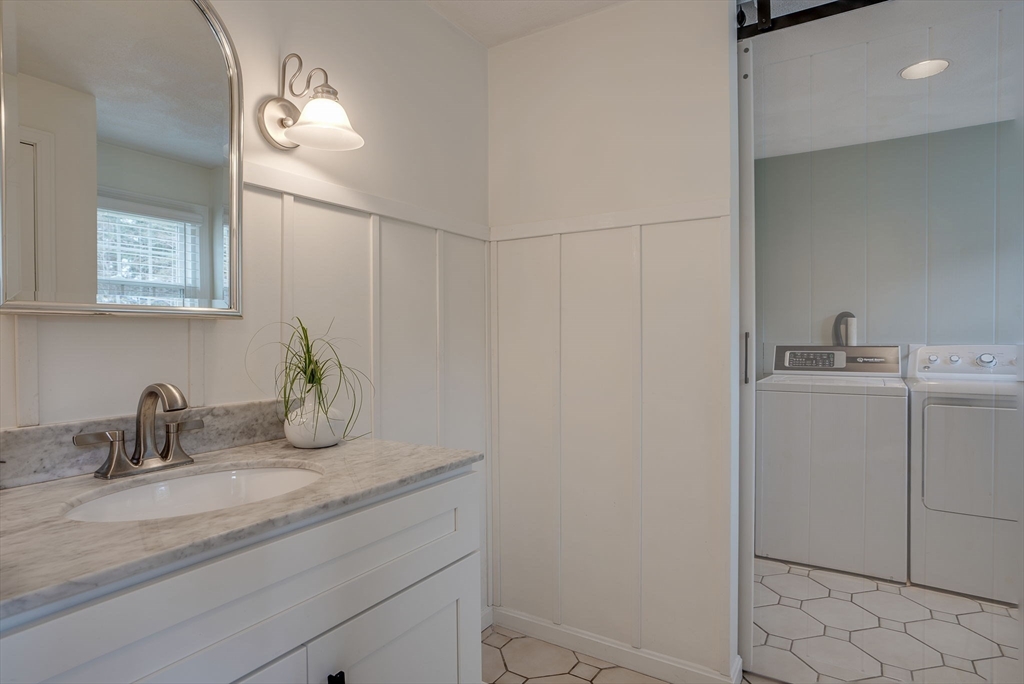 71 Houghton's Mill Road Lunenburg, MA 01462 - Photo 27 of 39 a bathroom with a sink and mirror