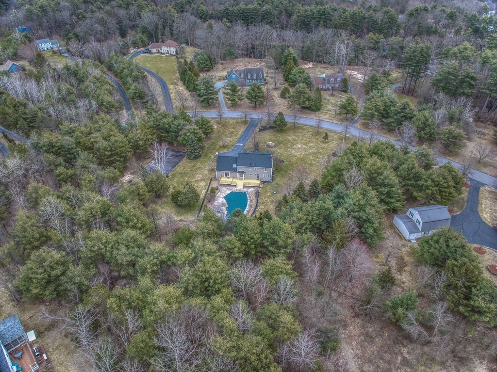 71 Houghton's Mill Road Lunenburg, MA 01462 - Photo 3 of 39 an aerial view of a house with a yard and lake view