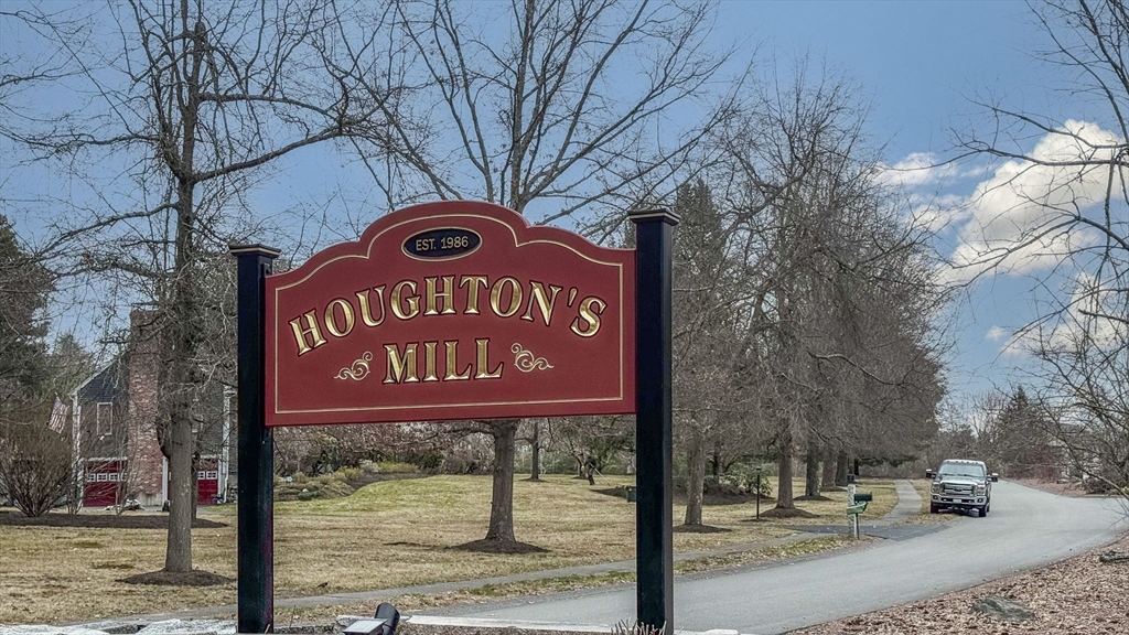 71 Houghton's Mill Road Lunenburg, MA 01462 - Photo 39 of 39 a sign on the side of a street