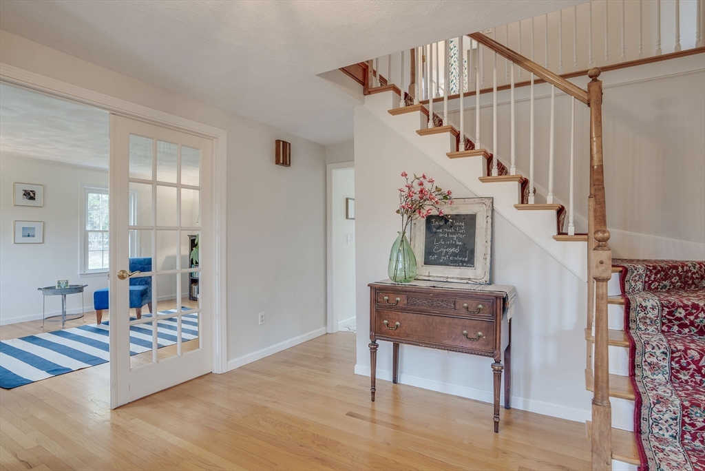 71 Houghton's Mill Road Lunenburg, MA 01462 - Photo 5 of 39 a view of entryway and hall with wooden floor