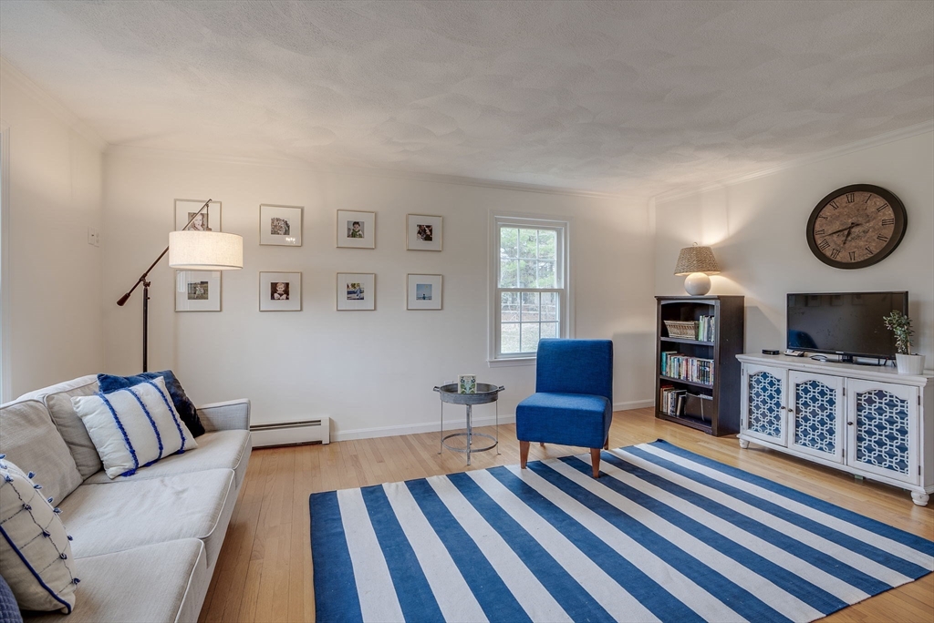71 Houghton's Mill Road Lunenburg, MA 01462 - Photo 7 of 39 a living room with furniture and a flat screen tv
